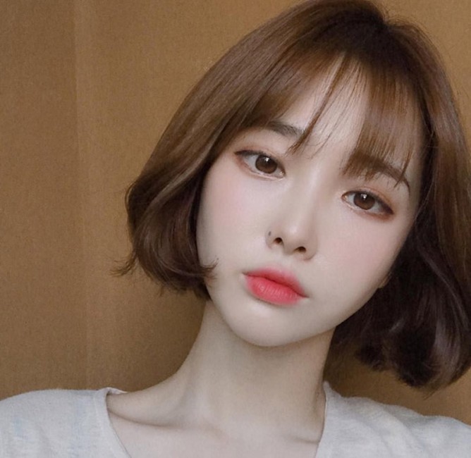 tóc uốn cụp đuôi 